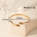Adjustable golden stainless steel open bangle featuring unique leaf palm hands design - Hugging Hands