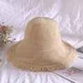 Damen Sonnenhut aus Raffia in Beige mit eleganten langen Fransen an der Krempe - M / Beige