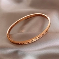 Macro shot of rose gold roman numerals and sparkling zircons on a luxury metal bangle - Roman Numeral Engraved Gold (2# Bracelet-Gold)