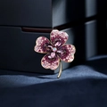 Elegant gold clover brooch with sparkling purple crystals on dark fabric background - 411# Purple Clover