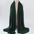 Elegant deep green chiffon hijab scarf for women displayed on a mannequin - 31