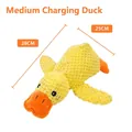 Dettaglio del peluche a forma di anatra gialla per cani con misure di 28 cm per 25 cm - Anatra con Squeak Media M