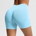 Seamless high waisted sky blue athletic shorts with scrunch butt lifting design for fitness - Light Blue