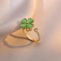 Adjustable gold open ring with green four-leaf clover and heart-shaped zircon detail - Green Heart Clover (J063)
