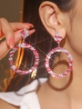Chunky hoop earrings with pink and silver crystals shown on model in a sparkling light - Pink Silver Alternate DTE1516125-S17ROW