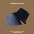 Close-up of a foldable reversible sun hat with wide brim and reinforced stitching detail - M (56-58cm) / Gray Blue & Black