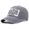 Detail of distressed brim with worn holes and Boston patch on gray washed cotton cap - Adjustable / Gray