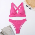 Flat lay of ribbed rose pink high waist bikini set with straw hat and sunglasses - S / Rose Red