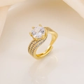 Close-up of golden adjustable ring with 3-carat round zircon and pavé diamond details - Gold White Zircon