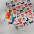 Close-up of 3D Halloween nail stickers with pumpkin and skull relief patterns - Halloween Horror Elements Style (CO-457)