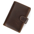 Detailed close-up of dark brown genuine leather wallet with fine stitching and grain texture - 6001 Style / Coffee
