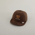 Close-up of brown cotton baby cap with embroidered bear and Lucky text detail - 50cm 1-2 Years / Brown