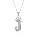 Silver letter J necklace featuring a crown design and sparkling pavé moissanite stones - Letter J