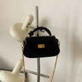Black mini crossbody bag with knot handle and golden chain strap in matte finish - Black