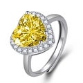 Adjustable silver heart ring featuring a vibrant yellow heart-cut center stone and pave frame - Yellow Zirconia