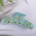 Light blue acetate hair claw clip featuring sparkling rhinestone butterfly designs - Sky Blue