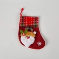 Red linen Christmas stocking featuring a 3D Santa Claus applique and snowflake pattern - Santa Claus / Red