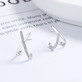 Paio di orecchini a croce a forma di X in argento sterling 925 con piccoli diamanti argentati - Argento 925 / Oro Bianco