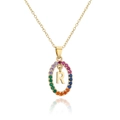 Detailed macro of gold letter R pendant with multi-color zircon stones and fine metal chain - Letter R