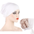 Detailed view of dual-layer white jersey cap featuring smooth champagne satin lining - White