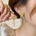 Pixel heart stud earrings with yellow crystals and pink rhinestone tassels on model - Yellow Gradient Rose Red Tassel (DTE1216380Y-RO)