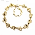 Detail of adjustable gold heart bracelet with micro-pave white zircon and lobster clasp - Heart Link / Gold