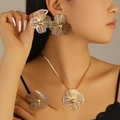 Golden 3-piece floral jewelry set featuring large petal earrings, necklace and ring - Rich Radiant Flower Style (8886)