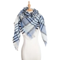Blue white and black plaid triangle scarf wrap with tassels on a female mannequin - Blue