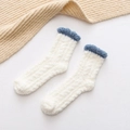 White coral fleece socks with blue rolled cuffs for winter warmth and home wear - White