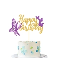 Detail von goldenem und lila Schmetterling Happy Birthday Kuchendeko auf Sahnetorte - Lila