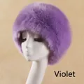 Close-up of violet faux fur cossack hat with dense texture for winter warmth - Taro Purple
