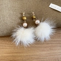 Detail of elegant earrings with tiger eye stone, pearl beads, and white soft plush pom poms - Tiger Eye Pom Pom Style / Silver Earring Post - Coffee
