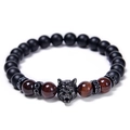 Macro detail of tiger eye beads and micro-pave zircon wolf head on men's bracelet - Red Tiger Eye Style