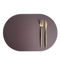 Oval dark purple faux leather placemat with gold cutlery on white background - Coffee & White