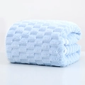 Folded light blue thick bath towel with waffle texture and soft microfiber fabric - 70x140cm Bath Towel / Blue