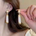 Pink pearl drop earrings with matte gold plating for a vintage elegant look - 42# Pink-White Pearlescent Cylindrical Streamline Drop Earrings (Silver Earring Post)
