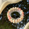 Elegant beaded bracelet with natural pale white and pink stones on a clear display - S045-fresh Red Jade Fragment Imitation Ceramic Bracelet #sz318