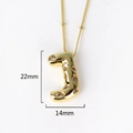 Detailed view of gold letter J pendant with cubic zirconia, size 22mm by 14mm - Letter J(XED218)