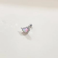 Detail of silver heart belly ring with pink and blue opal in arrow design - Arrow Through Heart Cartilage Stud