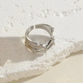 Silver multilayer geometric ring featuring shimmering zircon stones in a wave pattern - Bamboo Zirconia Platinum Color