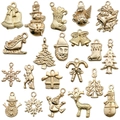 Collection of 20 gold Christmas DIY charms including reindeer, snowman and tree - Mixed 21 KC Gold Christmas Charms-31.5g-SN593