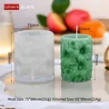 Cylindrical silicone mold for sunflower embossed candles and a green finished candle - Flower Column ZL-976
