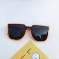 Fashionable oversized square sunglasses with orange and black frame and silver accents - Orange