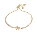 Detail of adjustable gold tennis bracelet with white zircon and geometric charm - Gold Taurus