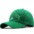 Green cotton baseball cap with New York embroidery shown from a professional 45-degree angle - Adjustable / Grass Green