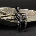 Punk black stainless steel spider pendant necklace on a stone over a dark background - Pendant Only (No Chain) / Black