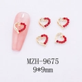 Detailed macro view of 9x9mm red heart nail charms with golden base for New Year art - 3D Hollow Heart Nail Art Charm (9675)