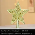 Macro shot of 20cm gold hollow Christmas tree topper star with floral pattern details - 20cm Hollow Flower Pattern Gold