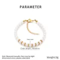 Detalle de pulsera de perlas de vidrio blancas con cierre de langosta dorado ajustable - 190mm x 6mm / Dorado 6mm