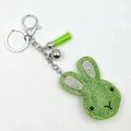 Sparkling green crystal rabbit head keychain with leather tassel and silver bell - Green